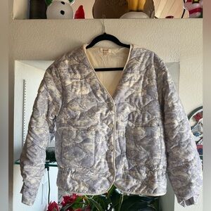 A. Peach puffer animal jacket